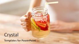  Presentation with mason jar - Colorful presentation theme enhanced with healthy eating detox and people concept - close up of woman holding mason jar glass with fruit water at home backdrop and a lemonade colored foreground