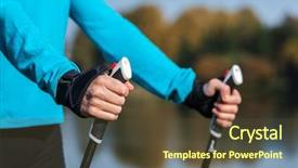  Presentation with walking exercise - Theme having nordic walking exercise adventure hiking concept - closeup of woman's hand holding nordic walking poles background and a tawny brown colored foreground