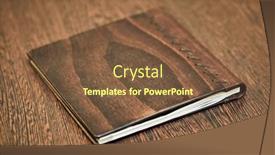  Presentation with note book - Presentation theme having note-book-with-hard-wooden background and a tawny brown colored foreground