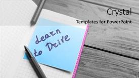  Presentation with learn - Cool new presentation with notepad and note sticker with text on wooden background learn to drive concept backdrop and a light gray colored foreground