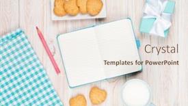  Presentation with white milk - Amazing presentation theme having notepad cup of milk heart shaped cookies and gift box on white wooden table backdrop and a sky blue colored foreground