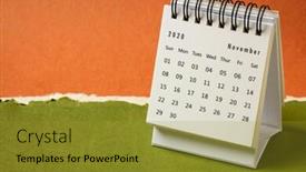  Presentation with november - Presentation theme consisting of november-2020-spiral-desktop-calendar background and a gold colored foreground