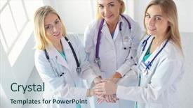  Presentation with multiracial team of young doctors stacking hands - Colorful PPT layouts enhanced with nurses in a medical team backdrop and a  colored foreground