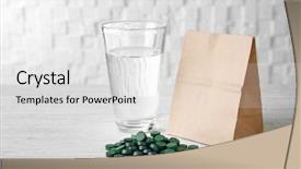  Presentation with water glass - Audience pleasing theme consisting of nutrition drinks minnerals vitamins - spirulina tablets and glass backdrop and a light gray colored foreground
