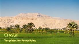  Presentation with oasis - Amazing PPT theme having oasis-in-the-valley backdrop and a tawny brown colored foreground