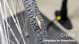  Presentation with tire - PPT theme consisting of od-worn-out-bicycle-tire background and a gray colored foreground