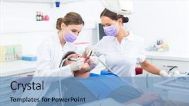  Presentation with odontology - Audience pleasing slides consisting of odontology - dentist in her practice backdrop and a teal colored foreground