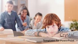  Presentation with classmates - PPT theme featuring offended-schoolboy-sitting-by-desk background and a coral colored foreground