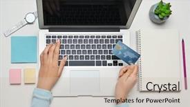  Presentation with credit card - PPT layouts enhanced with office computer stationery store - woman using laptop and credit background and a soft green colored foreground