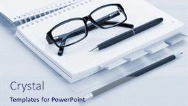  Presentation with notepad - Audience pleasing PPT theme consisting of phonebook - office table with glasses blank backdrop and a sky blue colored foreground