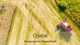  Presentation with trucking - Theme featuring oilfield trucking - aerial view of combine harvester background and a yellow colored foreground