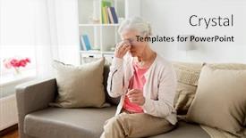  Presentation with old age - Slide set with old age health problem vision and people concept - senior woman with glasses sitting on sofa and having headache at home background and a light gray colored foreground