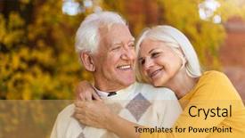  Presentation with elderly - Presentation theme having old days - elderly couple embracing in autumn background and a yellow colored foreground
