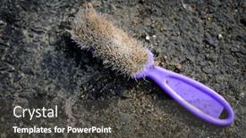  Presentation with garbage - Presentation theme with old-discarded-hairbrush-with-purple background and a dark gray colored foreground