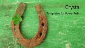  Presentation with four leaf clover - PPT theme having old horse shoe with clover background and a seafoam green colored foreground