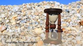  Presentation with old - Theme enhanced with old-hourgrlass-among-seashells background and a soft green colored foreground
