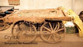 Presentation with old india - Amazing PPT theme having old-indian-cart-vegetable-trader backdrop and a coral colored foreground