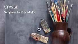  Presentation with paint art - Audience pleasing PPT theme consisting of old-paint-brush-and-tubes backdrop and a gray colored foreground