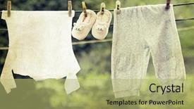  Presentation with old clothes - Beautiful PPT theme featuring washing line - old photo of baby clothes backdrop and a mint green colored foreground