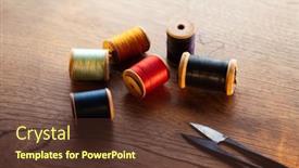  Presentation with thread - Presentation design having old-sewing-thread-with-wooden background and a tawny brown colored foreground