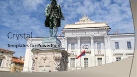  Presentation with old animal statue - Presentation theme having young handsome businessman sitting at a desk with stocks and progress charts behind him background and a dark gray colored foreground