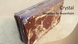  Presentation with old time americana - Audience pleasing PPT layouts consisting of old valise on yellow sand backdrop and a soft green colored foreground