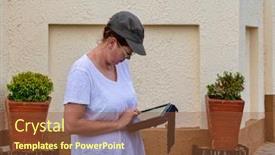  Presentation with street - PPT theme consisting of old-woman-using-a-tablet background and a tawny brown colored foreground