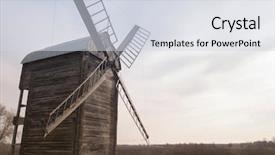  Presentation with old windmill - Slide deck featuring old wood windmill in green background and a sky blue colored foreground