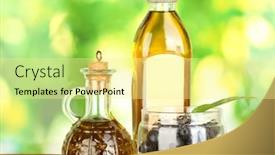  Presentation with olive oil bottle - Theme having olive oil bottle and small decanter on green background background and a blonde colored foreground