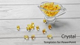  Presentation with liver - Slides with glass bowl with cod liver oil pills on white wooden table background and a light gray colored foreground