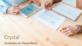  Presentation with software - Audience pleasing PPT theme consisting of one of young hi-tech designers pointing at paper with new layout while his colleague with touchpad working over smartphone software backdrop and a cream colored foreground