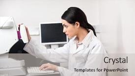  Presentation with optometrist - Audience pleasing PPT theme consisting of optometrist concentrating while storing data backdrop and a light gray colored foreground