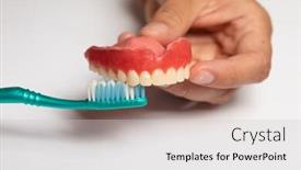  Presentation with dental prosthesis - PPT theme having oran-hygiene-doctor-dentist-show background and a light gray colored foreground