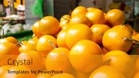  Presentation with orange fruit - PPT theme enhanced with orange fruit stacked on the marketplace at taiwan background and a gold colored foreground