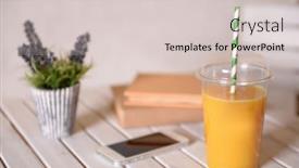  Presentation with fast food - Audience pleasing PPT theme consisting of orange juice in fast food closed cup with tube on wooden table with plant and light wall background backdrop and a lemonade colored foreground