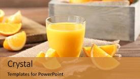  Presentation with orange juice - PPT theme consisting of orange juice on table close background and a gold colored foreground