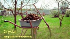  Presentation with fertilizer organic - Beautiful PPT theme featuring organic fertilizer - wheelbarrow full of manure backdrop and a tawny brown colored foreground