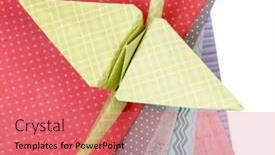  Presentation with origami crane - PPT theme featuring origami crane and color papers isolated on white background and a coral colored foreground