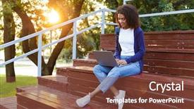  Presentation with african american in computer - PPT layouts having outdoors in park on steps background and a tawny brown colored foreground