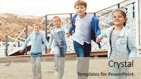  Presentation with children running - Theme consisting of blue and navy color background and a soft green colored foreground