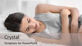 Presentation with abdominal - Audience pleasing PPT theme consisting of ovary - young woman suffering from abdominal backdrop and a light gray colored foreground