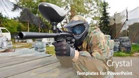  Presentation with shooting gun - Slide deck enhanced with paintball player in protective uniform and mask aiming gun before shooting in summer background and a coral colored foreground