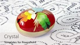  Presentation with tablecloth - PPT layouts with painted easter egg on white knitted tablecloth background and a soft green colored foreground