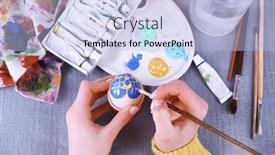  Presentation with colorful hands - PPT theme enhanced with painting easter eggs by female hands on colorful tablecloth background background and a light blue colored foreground