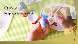  Presentation with colorful hands - PPT theme having painting easter eggs by female hands on colorful tablecloth background background and a soft green colored foreground