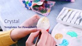  Presentation with colorful hands - Slide deck featuring painting easter eggs by female hands on colorful tablecloth background background and a sky blue colored foreground