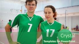  Presentation with volleyball - Audience pleasing theme consisting of pair in green with ball are in gym during volleyball game playing people out of focus backdrop and a ocean colored foreground
