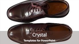  Presentation with men shoes - Theme with pair of adult men's shoes isolated on white background and a tawny brown colored foreground