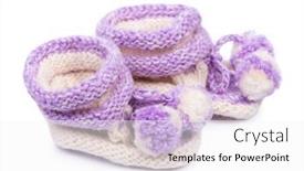  Presentation with pair - Colorful presentation design enhanced with pair-of-baby-bootees-isolated backdrop and a white colored foreground