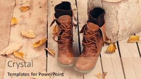  Presentation with leather shoes - PPT theme featuring pair of brown boots with socks inside on barn wooden background autumn seasonal footwear leather shoes background and a coral colored foreground